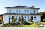 massivhaus-doppelhaus-bremen-fertighaus-D-128-Putz-1-scaled